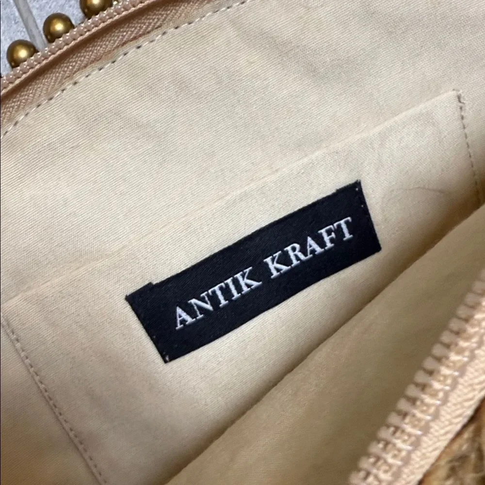 Antik Kraft Tan and Green Woven Clutch